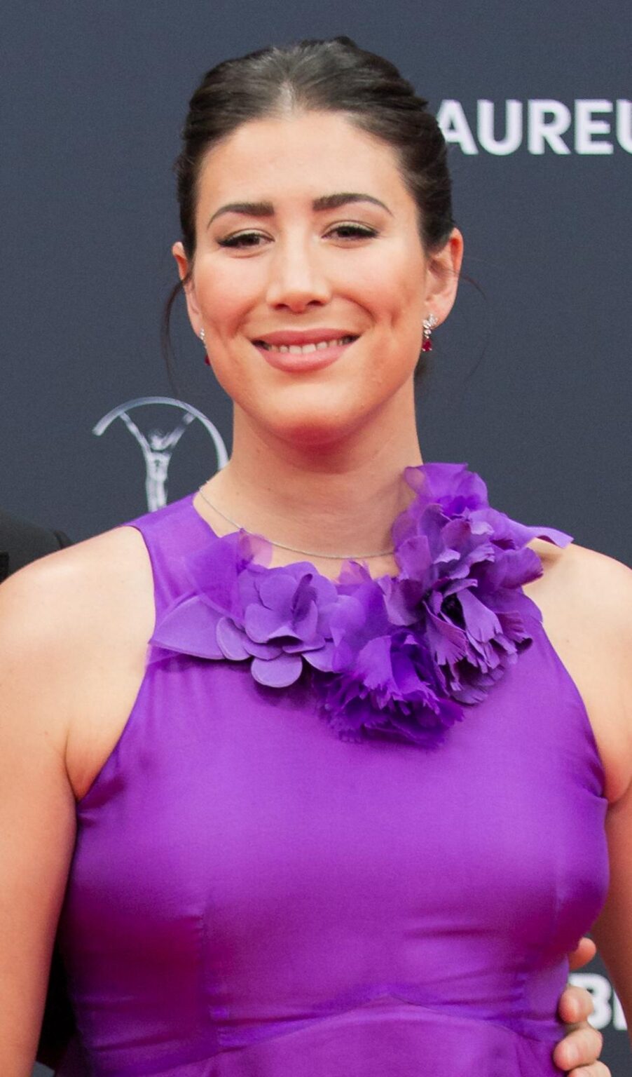 Garbine Muguruza Flaunts Her Baby Bump in a Stunning Swimsuit!